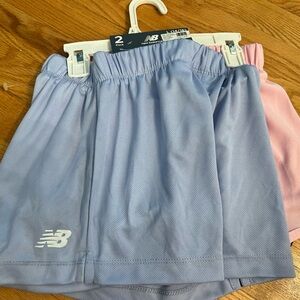 2 pair new balance shorts